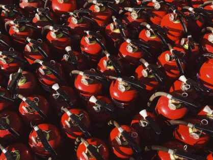 A bunch of fire extinguishers {{brizy_dc_image_alt imageSrc=